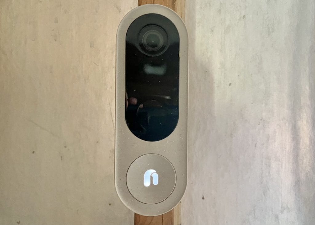 The Nooie Cam Doorbell has a bit of dust on it after 3 months on the job